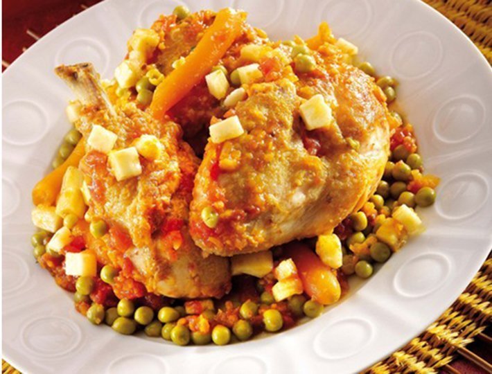 Recette Maître CoQ, de Curry de poulet aux petits pois et jeunes carottes.